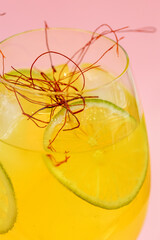 summer cocktail with citrus fruits in a glass