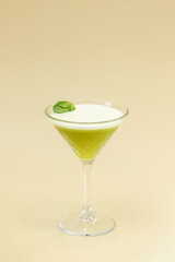 alcoholic cocktail with mint in a glass