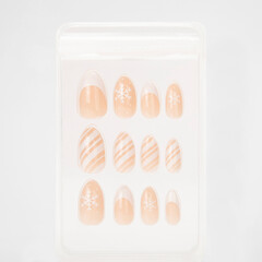 realistic set of colored false nails adhesive isolated on white background. top view. false nails...