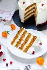 Slice of fresh homemade carrot cake With Cream Cheese Frosting