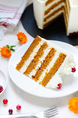 Slice of fresh homemade carrot cake With Cream Cheese Frosting