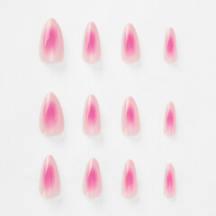 realistic set of colored false nails adhesive isolated on white background. top view. false nails...