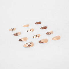 realistic set of colored false nails adhesive isolated on white background. top view. false nails acrylic nails for women. different fashion nail shapes.