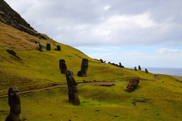 Moai statues that were never completed in the quarry of at Rano Raraku, Easter Island, Chile, South...