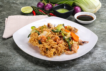 Asian cuisine - Fried noodles with seafood