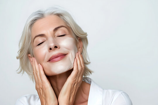 Skincare Elegance, Older Woman Demonstrates Anti-Age Lift Results on isolated white background