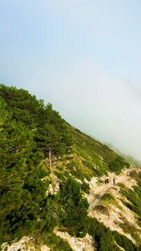 Group of People Hiking along a Mountain Trail in Albania