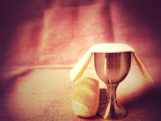 Lent Season, Holy Week and Maundy Thursday Concept - with chalice and bread in red colour...