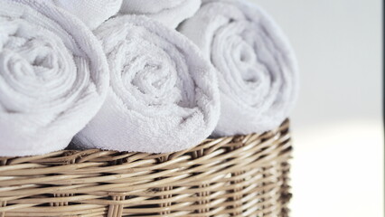 Obraz na płótnie Canvas Beautifully folded white towels and toiletries. Luxury bedroom in the bedroom ,Bed, hotel, bedroom, hotel room, towel, liquid soap