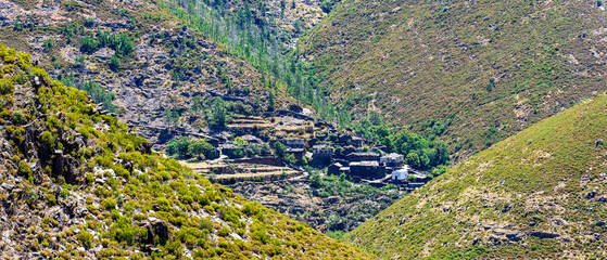 general view to the uninhabited Portuguese village of Drave inserted in the valleys of Serra da Freita. Magic village