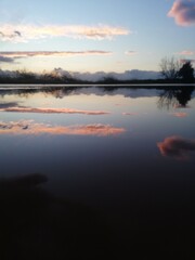 Fototapeta premium Reflection of sunset on a pond.