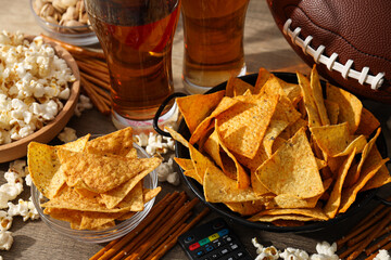 Beer with snacks and a rugby ball