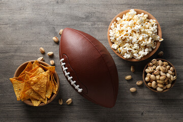 Bowl of chips and popcorn with rugby ball - obrazy, fototapety, plakaty