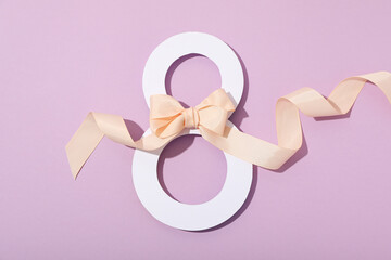 Paper figure eight with beautiful satin ribbon
