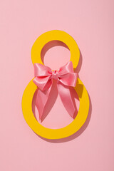 Paper figure eight with a beautiful satin bow