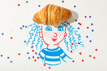A painted French girl with a croissant on her head.