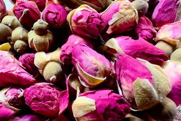 The beauty of dried roses on a granite floor