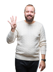 Young caucasian hipster man wearing winter sweater over isolated background showing and pointing up with fingers number four while smiling confident and happy.