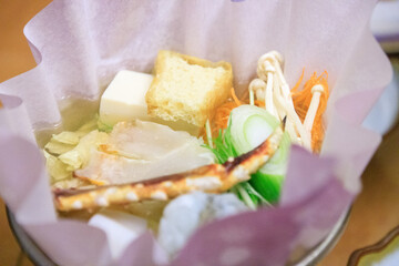 Obraz na płótnie Canvas A Glimpse into Delicious Japanese Seafood Hotpot