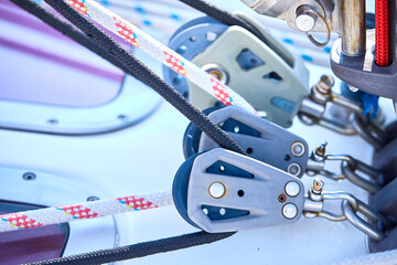 Detail of a mooring rope placed on sailing boat yacht desk