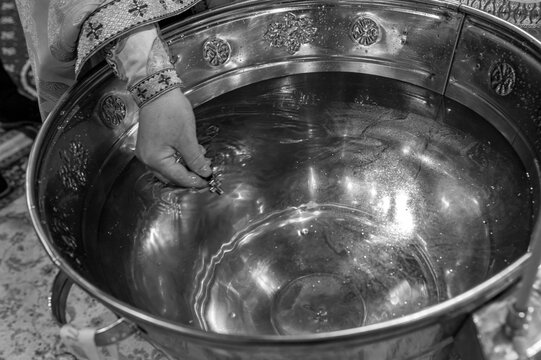 baptismal font with water for the Orthodox baptism in the church