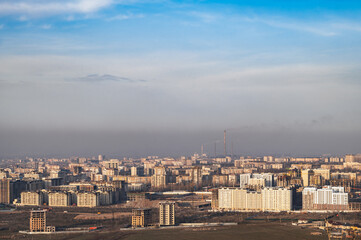 Panorama of the city of the capital of Kyrgyzstan, Bishkek. Smog over the city.