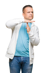 Middle age arab man wearing sweatshirt over isolated background Doing time out gesture with hands,...