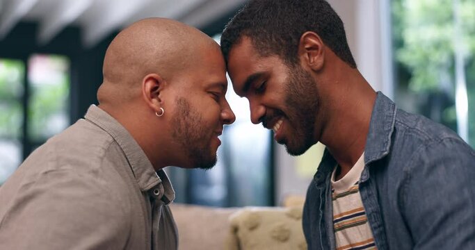 Gay partner, bonding and love in living room in happiness for care and wellness in trust on sofa. Dating, touch and LGBTQ couple in romantic moment, commitment and relax together on weekend in home
