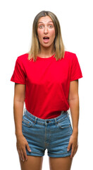 Obraz premium Young beautiful woman over isolated background afraid and shocked with surprise expression, fear and excited face.