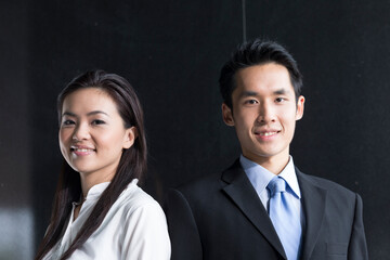 Portrait of Asian business partners.