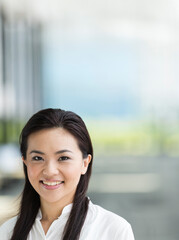 Chinese business woman in modern Asian city.