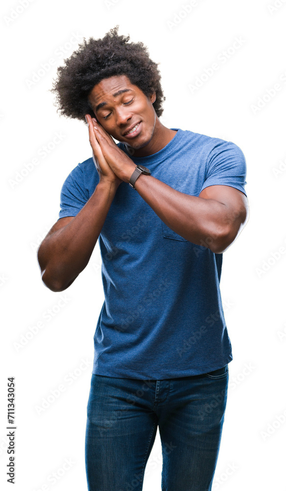 Poster Afro american man over isolated background sleeping tired dreaming and posing with hands together while smiling with closed eyes.