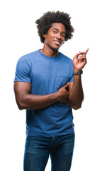 Afro american man over isolated background with a big smile on face, pointing with hand and finger to the side looking at the camera.