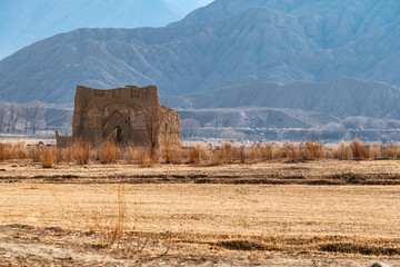 Ruins of an ancient mazar in the Naryn region of Kyrgyzstan. Ancient typical religious buildings of...