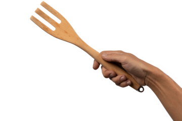 Hand holding wooden fork no background cutout