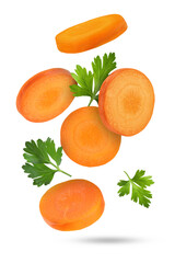 Fresh carrot slices and green parsley falling on white background