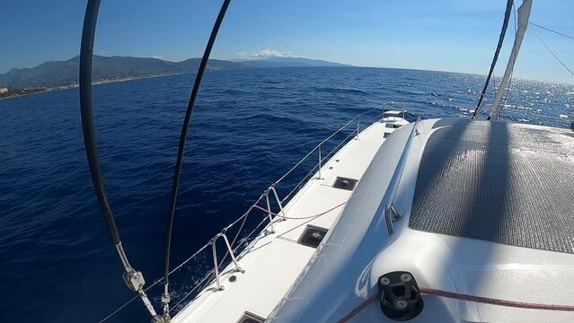 Sailing catamaran in the Mediterranean Sea near Monte Carlo, luxury yacht travel