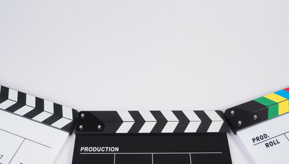 Three Clapper board or movie slate on white background..