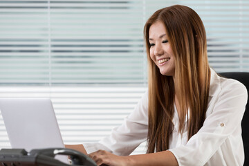 Asian woman at work