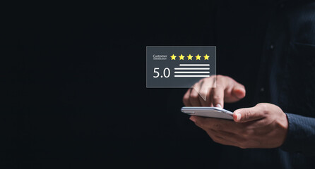 Customer Satisfaction Survey concept, Customers use smartphone give excellent five-star ratings for...