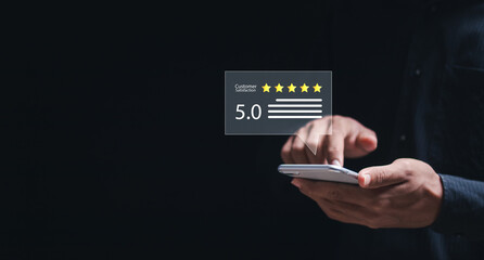 Customer Satisfaction Survey concept, Customers use smartphone give excellent five-star ratings for service experience rating online application, satisfaction feedback review, good quality most.