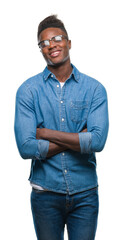 Fototapeta premium Young african american man over isolated background happy face smiling with crossed arms looking at the camera. Positive person.