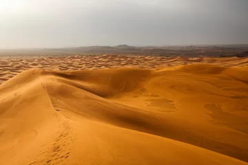 Schilderijen op glas Colorful desert dunes with beautiful background in Sahara, Merzouga, Morocco © danmir12