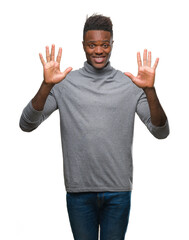 Young african american man over isolated background showing and pointing up with fingers number ten while smiling confident and happy.