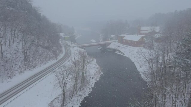 Rosendale, New York, on a snowy, beautiful winter day, during a nor'easter, as seen from the high trestle bridge,  over the Rondout Creek, on the Wallkill Valley rail trail far above the village