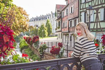 Vacation in France. Concept of tourism and holidays. Woman in city scene