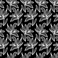 Trendy floral seamless pattern. Hand-drawn contour white lines of fantastic flowers on a black background. Vector sketch illustration of tropical plants
