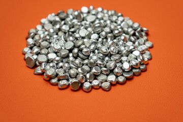 Aluminum tart stones in glass jar