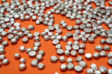 Aluminum tart stones in glass jar