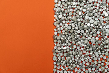 Aluminum tart stones in glass jar